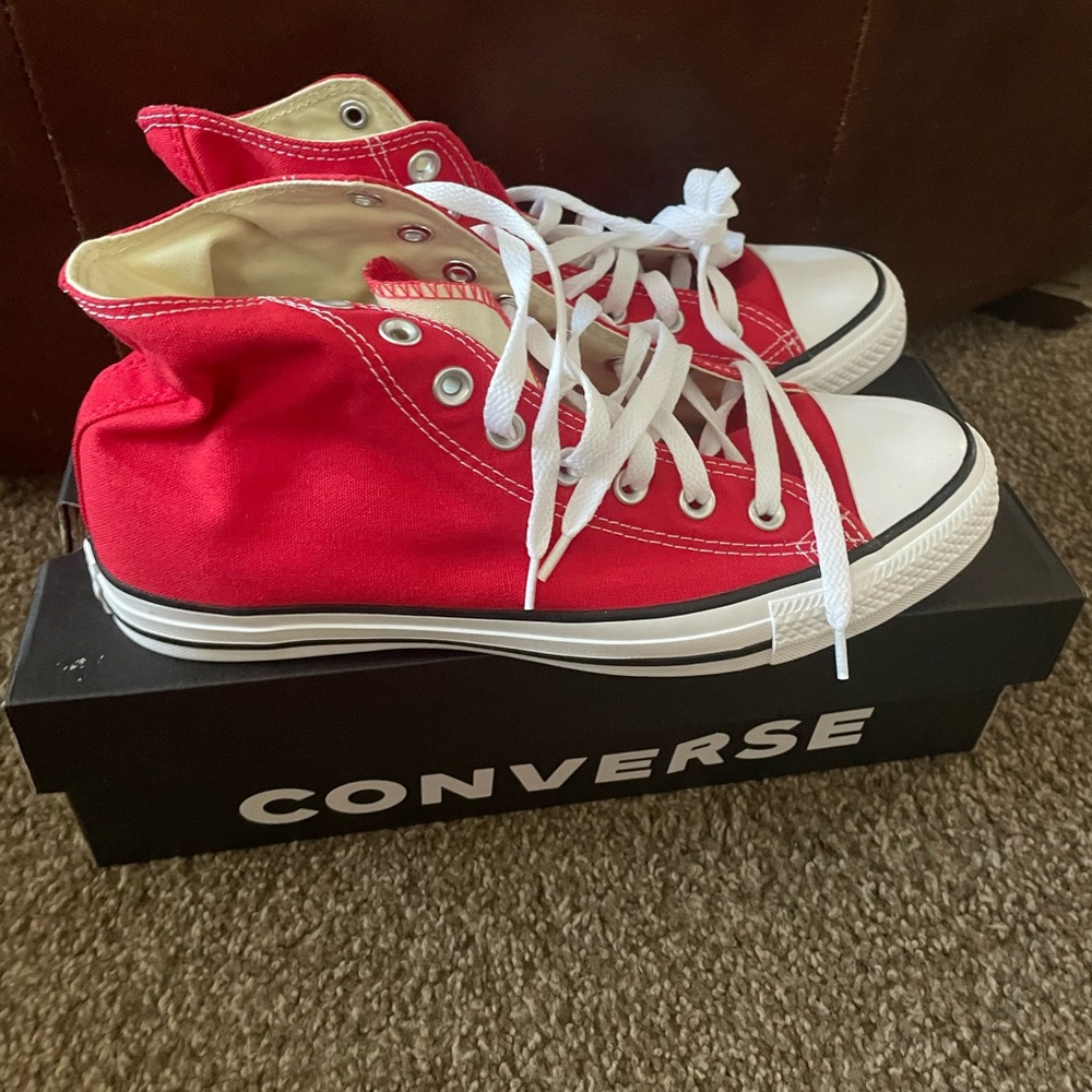 New never worn Red Converse high tops men’s 8.5/womens 10.5